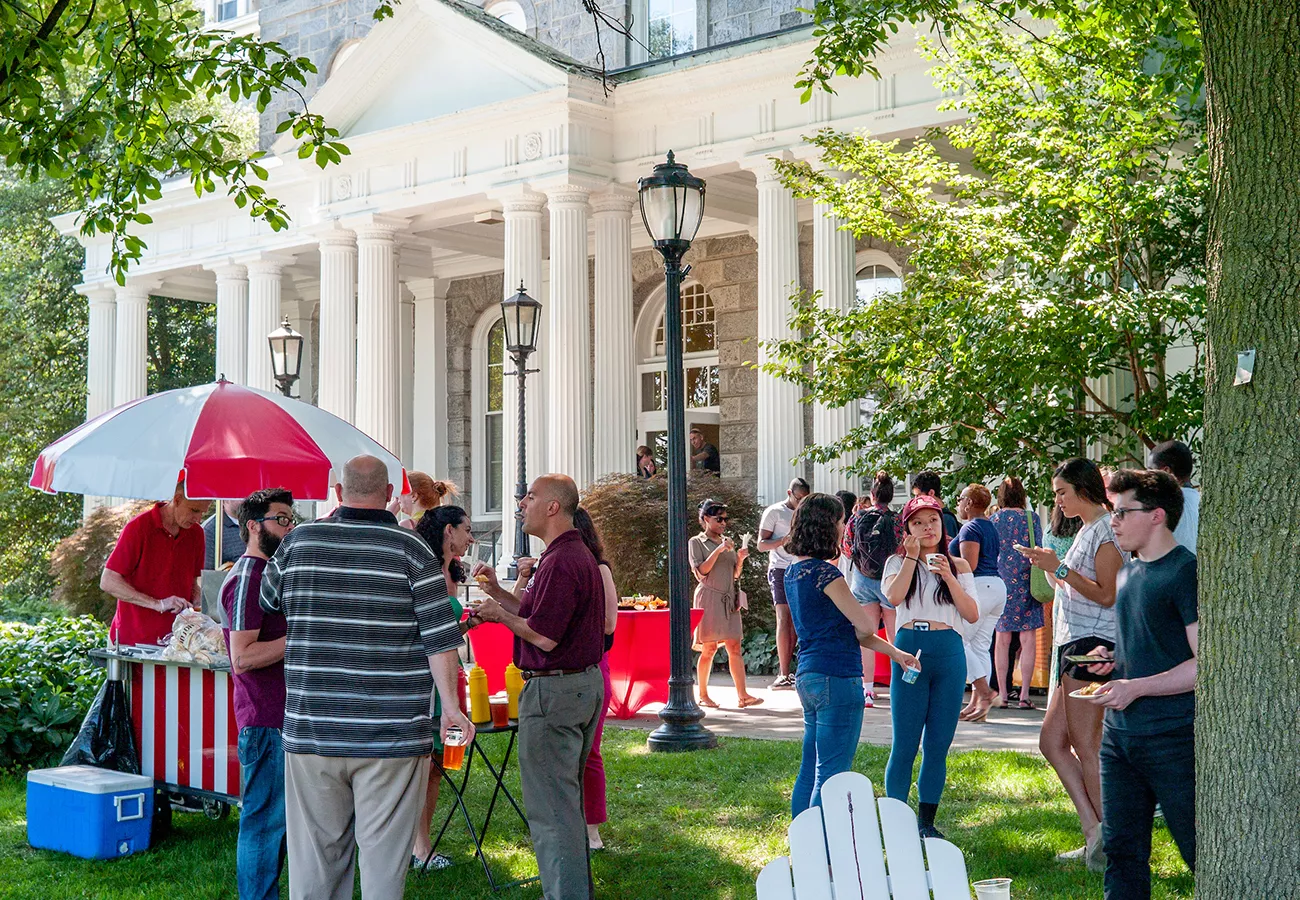Summer gathering in front of Parrish Hall