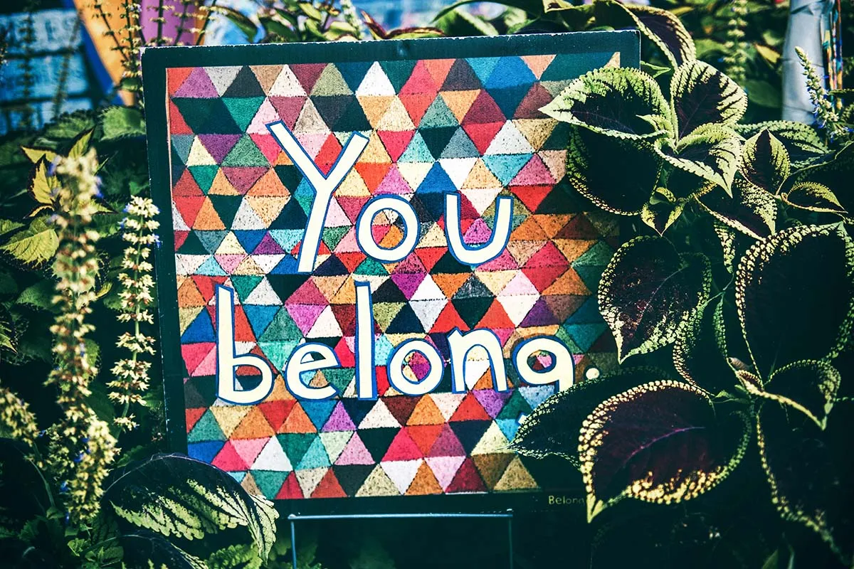 colorful quilt reads YOU BELONG