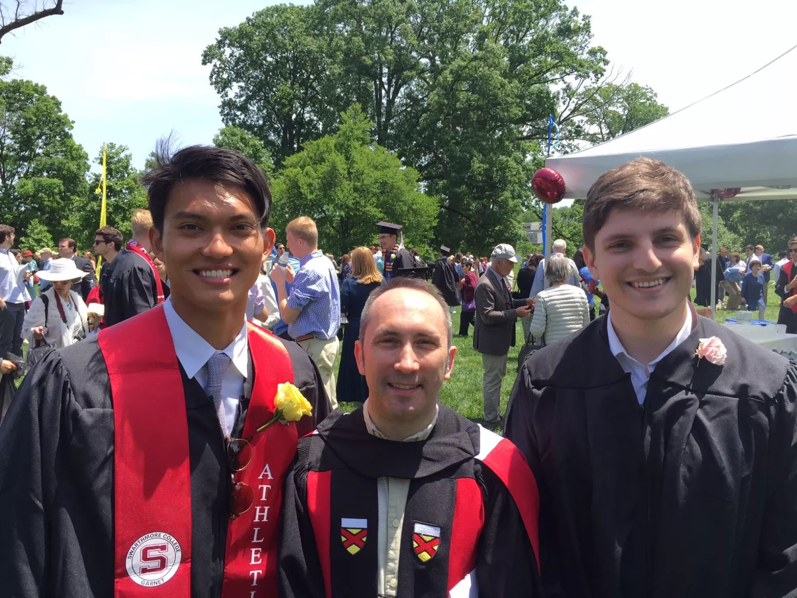 Students stand with Professor Will Gardner at commencement 2017